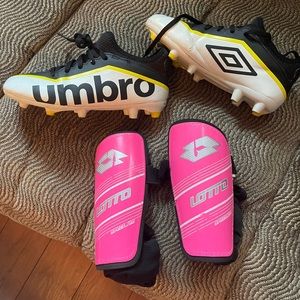 Size 3 girl’s soccer cleats and size medium shin guards